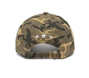 Detail of camouflage baseball cap back showing white stars embroidery and metal buckle