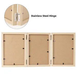 Detail of stable stainless steel hinges on modern minimalist triple folding wooden frame