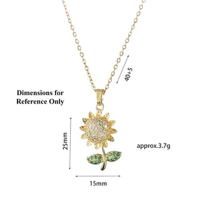 Gold sunflower pendant necklace with green leaf and clear cubic zirconia stones