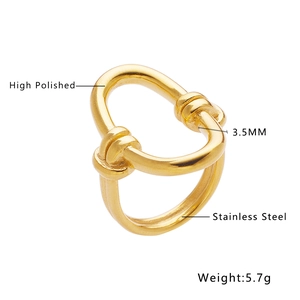 Detail view of double knot gold ring with specifications 3.5mm width and 5.7g weight
