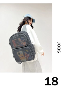 Detail view of a gray mesh backpack showing interior items like books and phone case