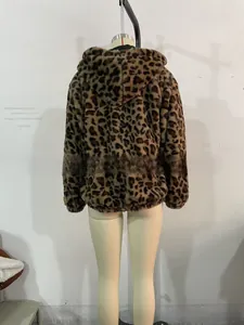 Detailed view of leopard print faux fur hoodie with soft texture and zip closure