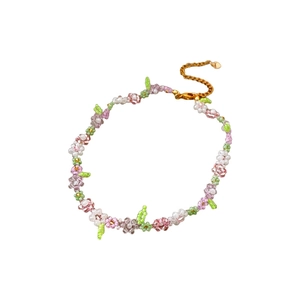Handmade flower beaded necklace set with pink and purple petals and a gold lobster clasp