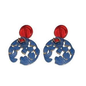 Vintage-style earrings with red round beads and blue hollow floral metal pendants