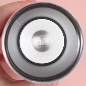 Macro detail of food-grade SUS 304 stainless steel inner bottom of vacuum coffee tumbler