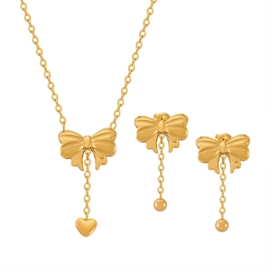 Gold plated stainless steel jewelry set with bow and heart pendants for women