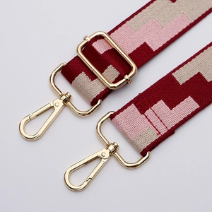 Adjustable wide replacement shoulder strap with burgundy geometric woven pattern and gold hooks
