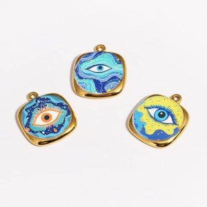 Three square evil eye pendants in gold frames with colorful oil painting enamel designs