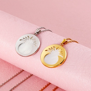 Golden and silver stainless steel necklace with round pineapple shell pendant