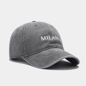 Vintage washed dark grey baseball cap featuring white MILAN embroidery and curved brim