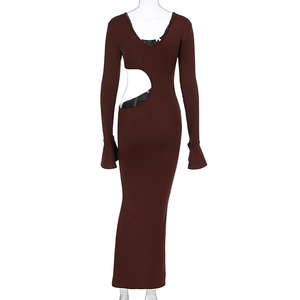 Detail of chocolate brown knit maxi dress with side waist cutout and long flared sleeves