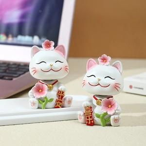 Cute cherry blossom lucky cat figurines as desk decor and resin phone holders