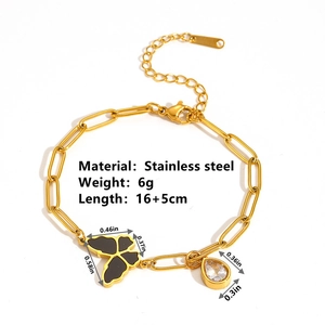 Bracelet en acier inoxydable plaqué or 18 carats avec pendentifs papillon et zircon