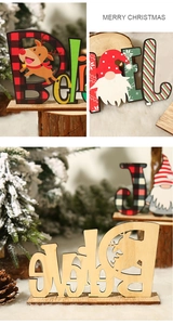 Detalle de carteles navideños de madera Believe y Joy con renos de cuadros y Papá Noel
