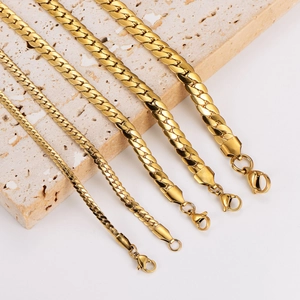 Minimalist gold stainless steel flat dragon chain necklaces in five different widths