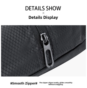 Macro shot of smooth matte black metal zipper on diamond ripstop fabric gym bag