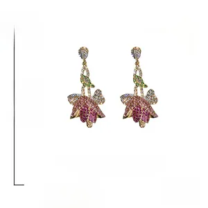 Detail of tulip floral drop earrings with rhinestone pavé and S925 silver needle size specs