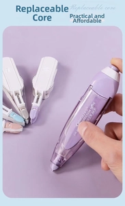Detail showing the inner refillable mechanism and 6M length of the purple correction tape