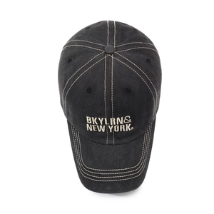 Vintage washed black baseball cap with white BKYLRN embroidery and contrast stitching