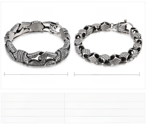 Close-up of retro punk steel bracelets with vintage floral and rhombic textures