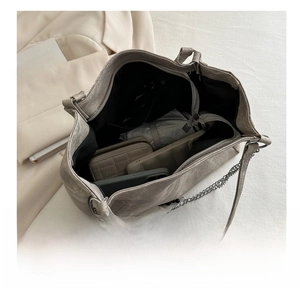 Spacious light grey tote bag showing large capacity for wallet, phone and umbrella