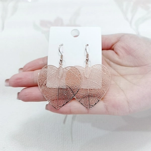 Elegant rose gold heart-shaped leaf earrings with intricate openwork vein textures