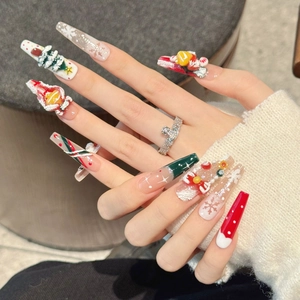 3D Christmas press-on nails featuring Santa, snowflakes, and festive glitter patterns