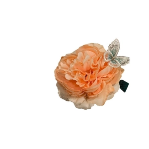 Elegant floral hair claw with a peach fabric flower and embroidered butterfly detail