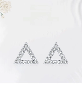 Close-up of S925 sterling silver triangle stud earrings with micro-pave zircon crystals