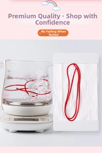 Close-up showing colorfastness of red braided cord during boiling water test