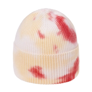Tie-dye knit beanie featuring red and orange gradient patterns on white base