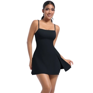 Close-up of black athletic tennis dress featuring thin straps and side slit hem