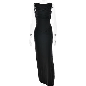 Detail of elegant black sleeveless evening dress showing pleated textures and slim fit