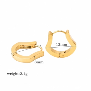 Macro shot of gold geometric U-shaped earrings with measurements and weight details