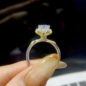 Elegant vine moissanite ring with flower petal setting in silver and gold dual-tone