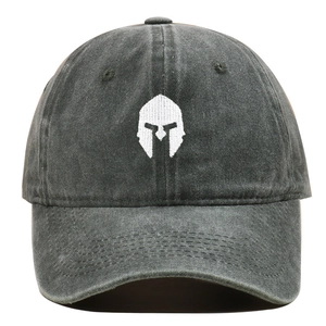 Close-up of white spartan helmet embroidery on washed dark grey cotton baseball cap