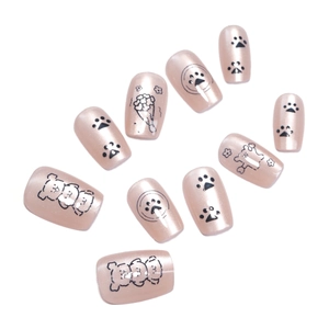 Cute cartoon puppy patterns on nude pink pearlescent press-on nails with cat eye finish