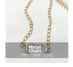 Detailed macro view of high-quality polished golden metal chain strap for handbags