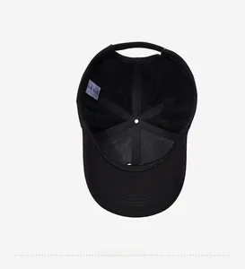 Internal view of black baseball cap showing reinforced stitching and breathable fabric