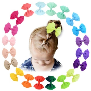 Detailed view of kids colorful grosgrain ribbon hair bows in nineteen assorted vibrant colors