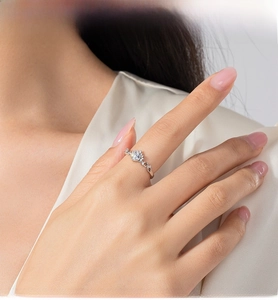 Detailed view of an elegant S925 silver ring featuring a round brilliant-cut center stone