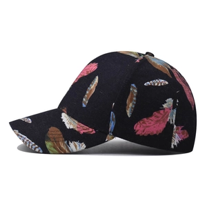 Black cotton baseball cap featuring colorful feather prints and a classic curved brim style
