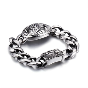Retro silver cross and skull embossed plate on Cuban chain bracelet for men