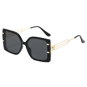 Square black frame sunglasses with gold hollow metal temples and dark grey lenses