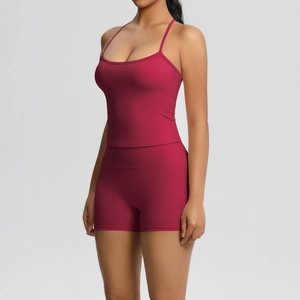 Detail of high-waist berry red yoga shorts with seamless waistband and matte finish fabric