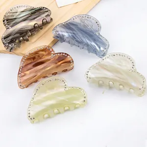 Elegant 8cm resin hair claw clips with marble texture and rhinestones in various colors