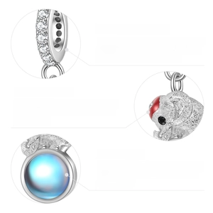 Detailed close-up of 925 sterling silver elephant charm with moonstone and cubic zirconia
