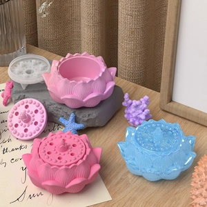 Detail view of lotus-shaped resin storage box with silicone mold and petals