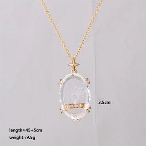 Detail showing crystal Tarot necklace pendant with tree pattern and dimensions