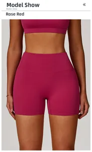Detail of high-waisted rose red yoga shorts with elastic fabric for fitness training